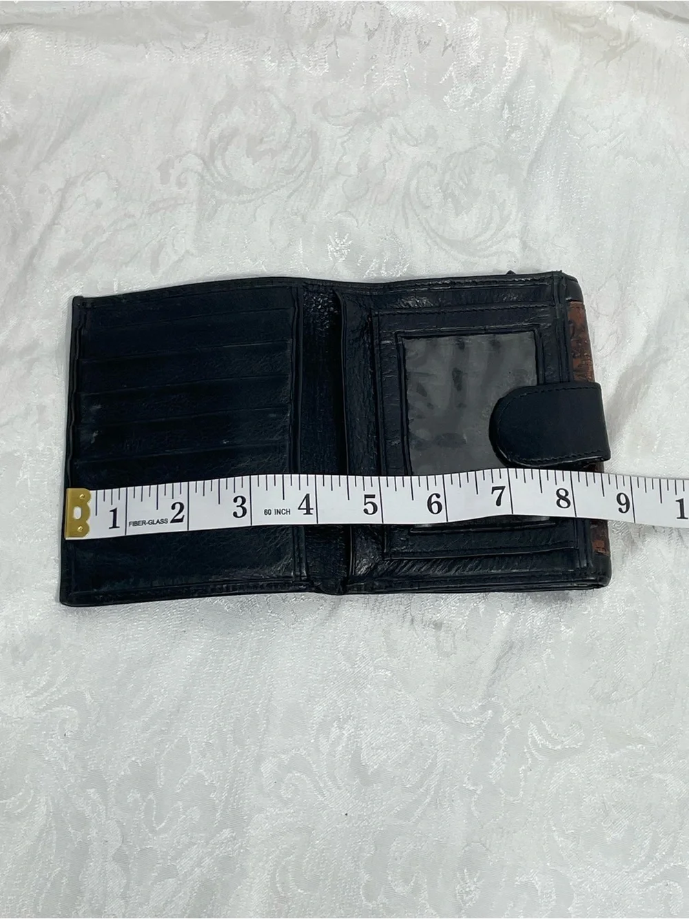 Brighton Vintage Tooled Leather Bifold Wallet in Black and Brown.